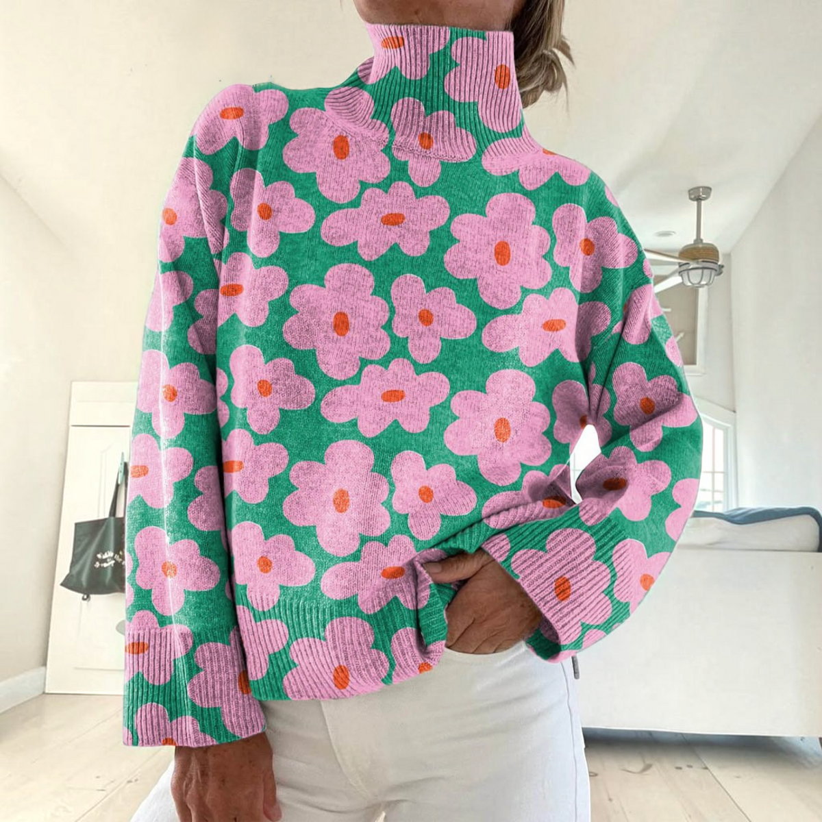 Linda | Rosa Rollkragenpullover mit Blumenmuster