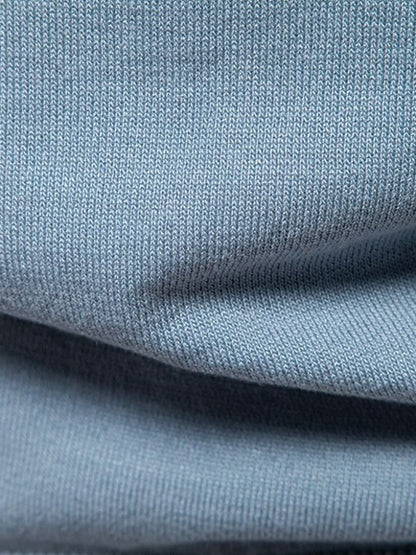 Kaspar | Schwarz-camelbraunes Colorblock-Poloshirt