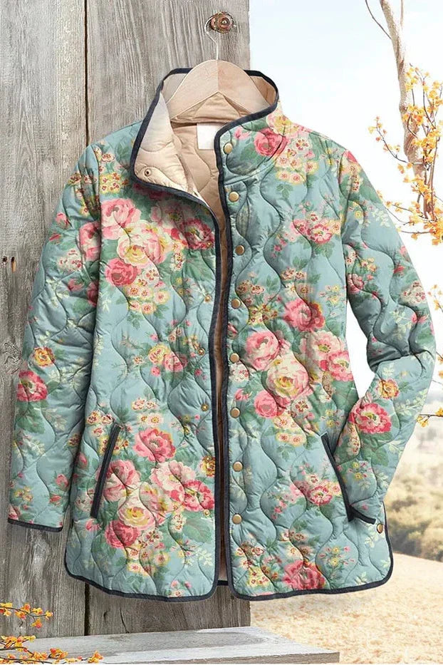 Marianne | Hellblaue gesteppte Jacke mit Rosenmuster