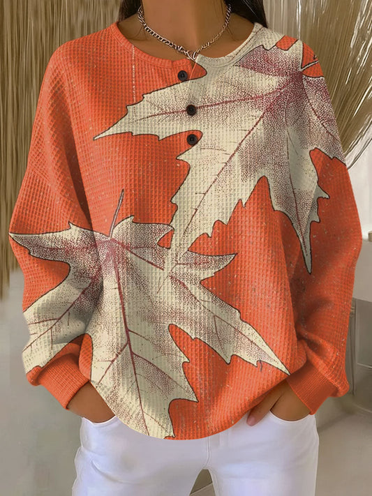 Marlene | Pullover in Orange mit Herbstblättern