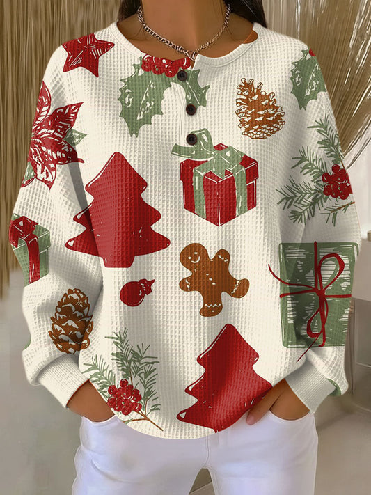 Thea | Weihnachtspullover mit Tannen und Geschenken