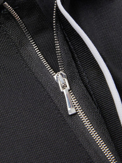 Hans-Georg | Schwarzes Poloshirt mit Reißverschlusskragen